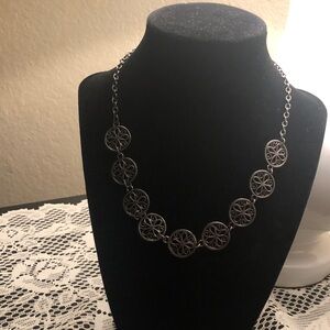 Elegant Black Necklace with Floral Discs